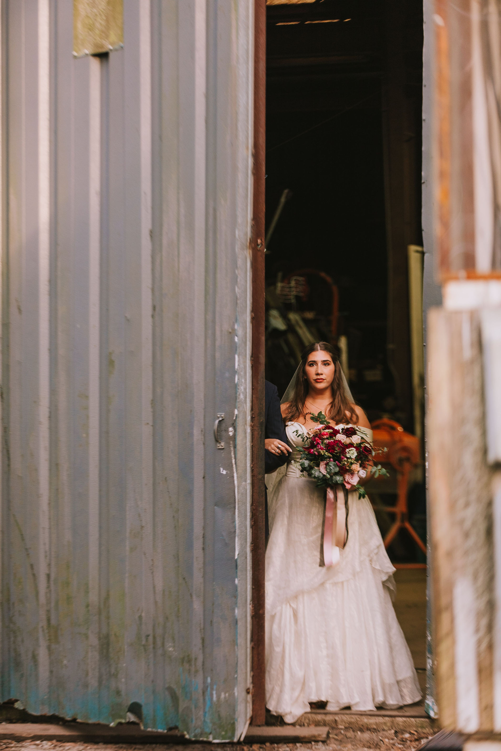 Industrial wedding bride walking down the aisle 