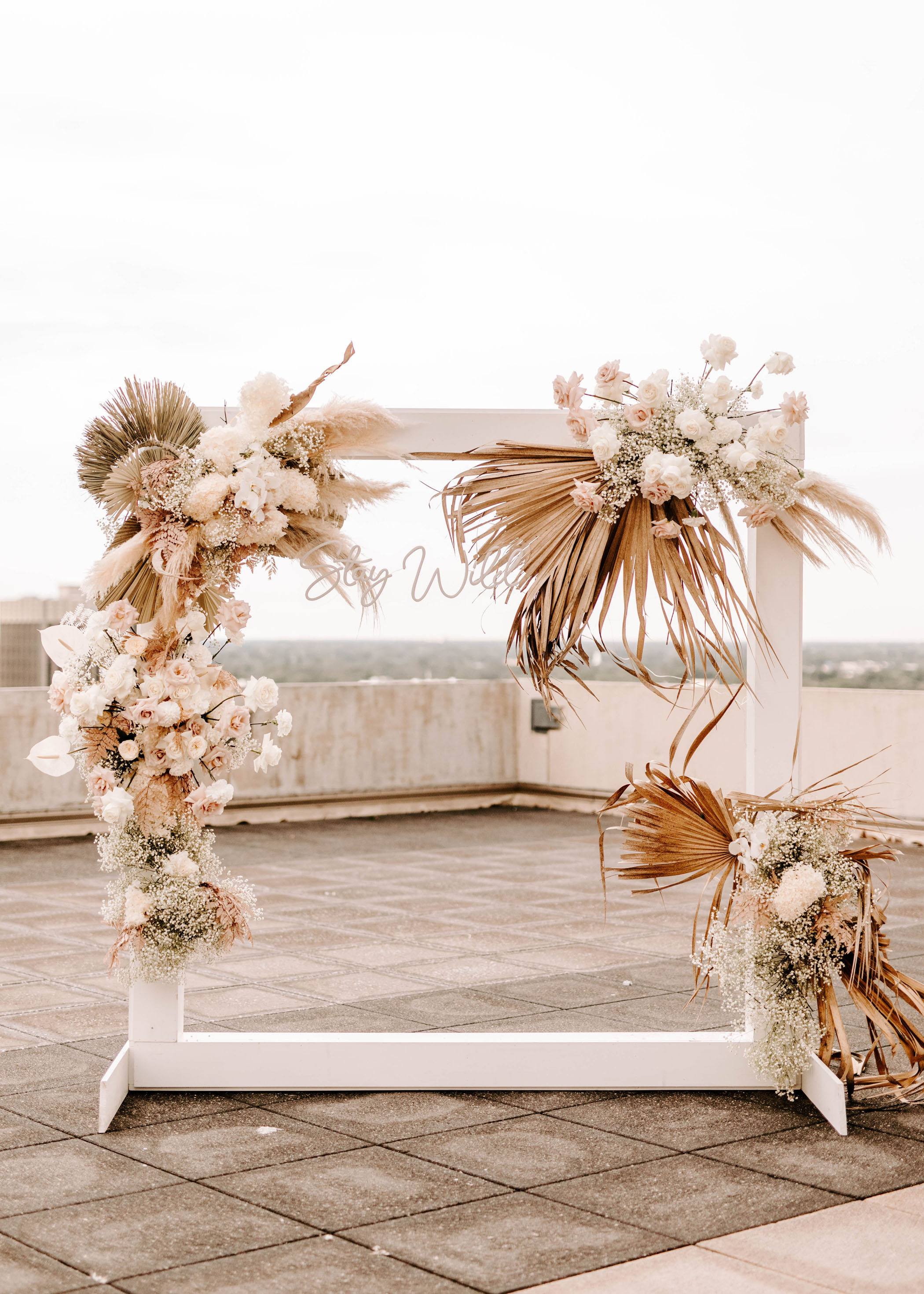 dried flower boho wedding ceremony backdrop