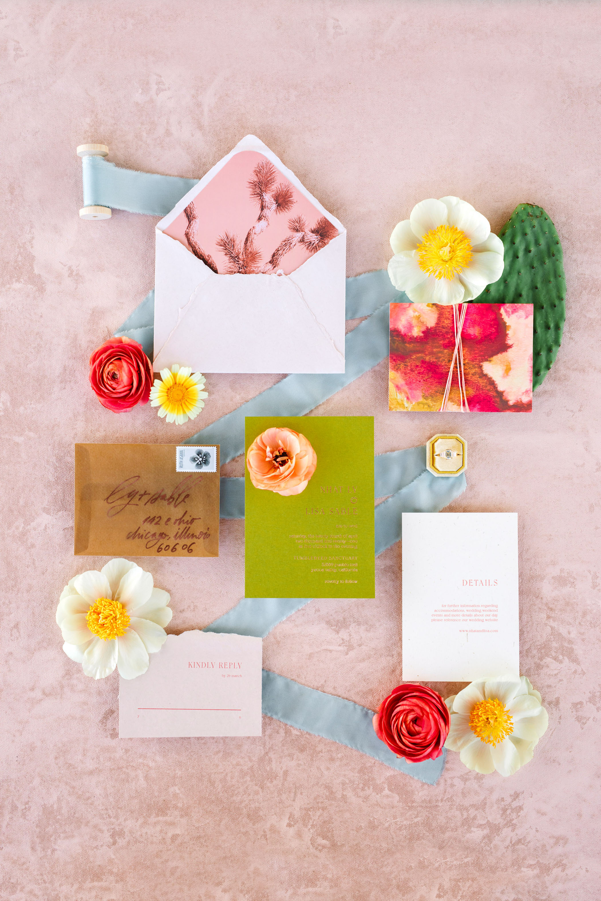 colorful wedding invitation flat lay