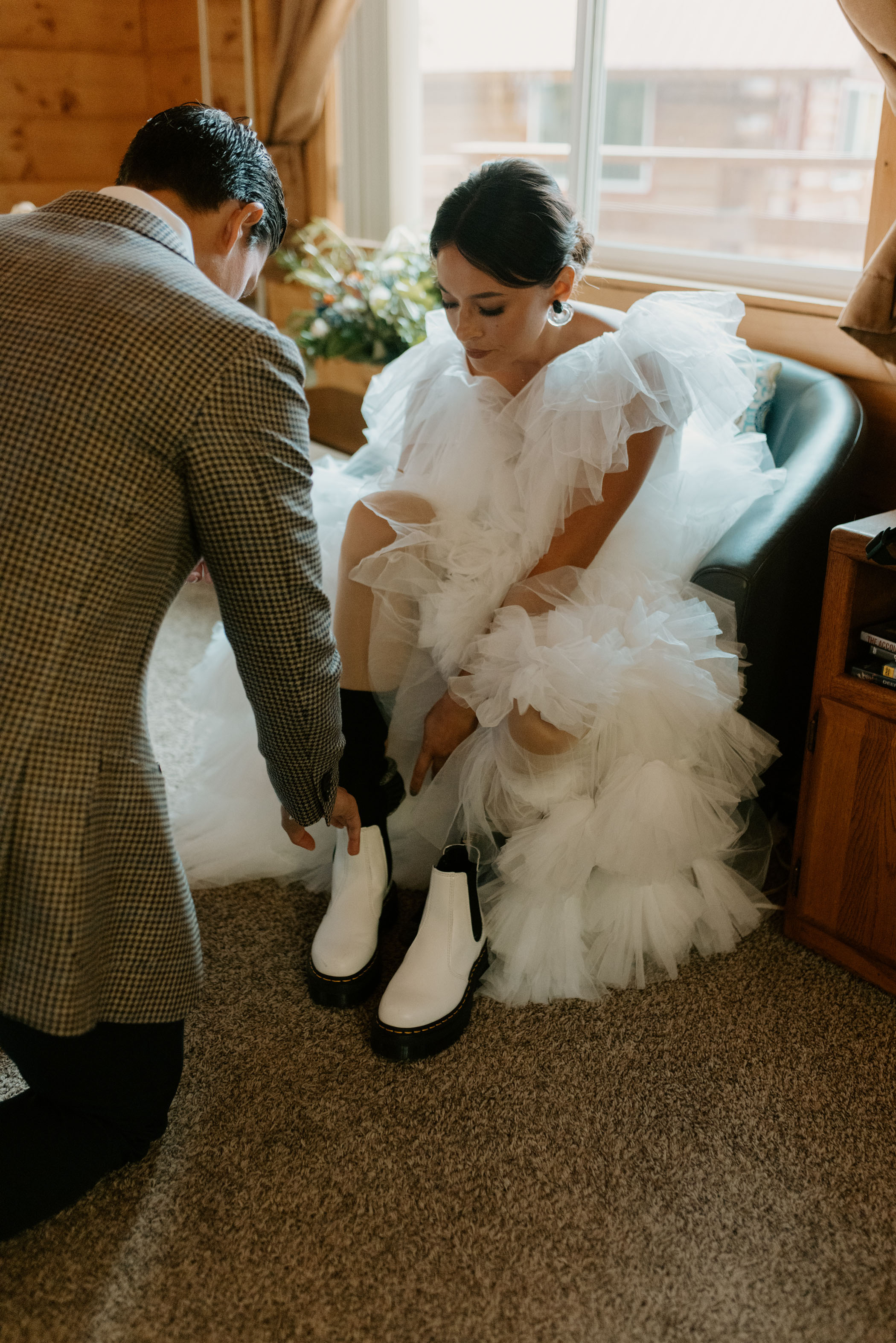 Bride wearing white boots