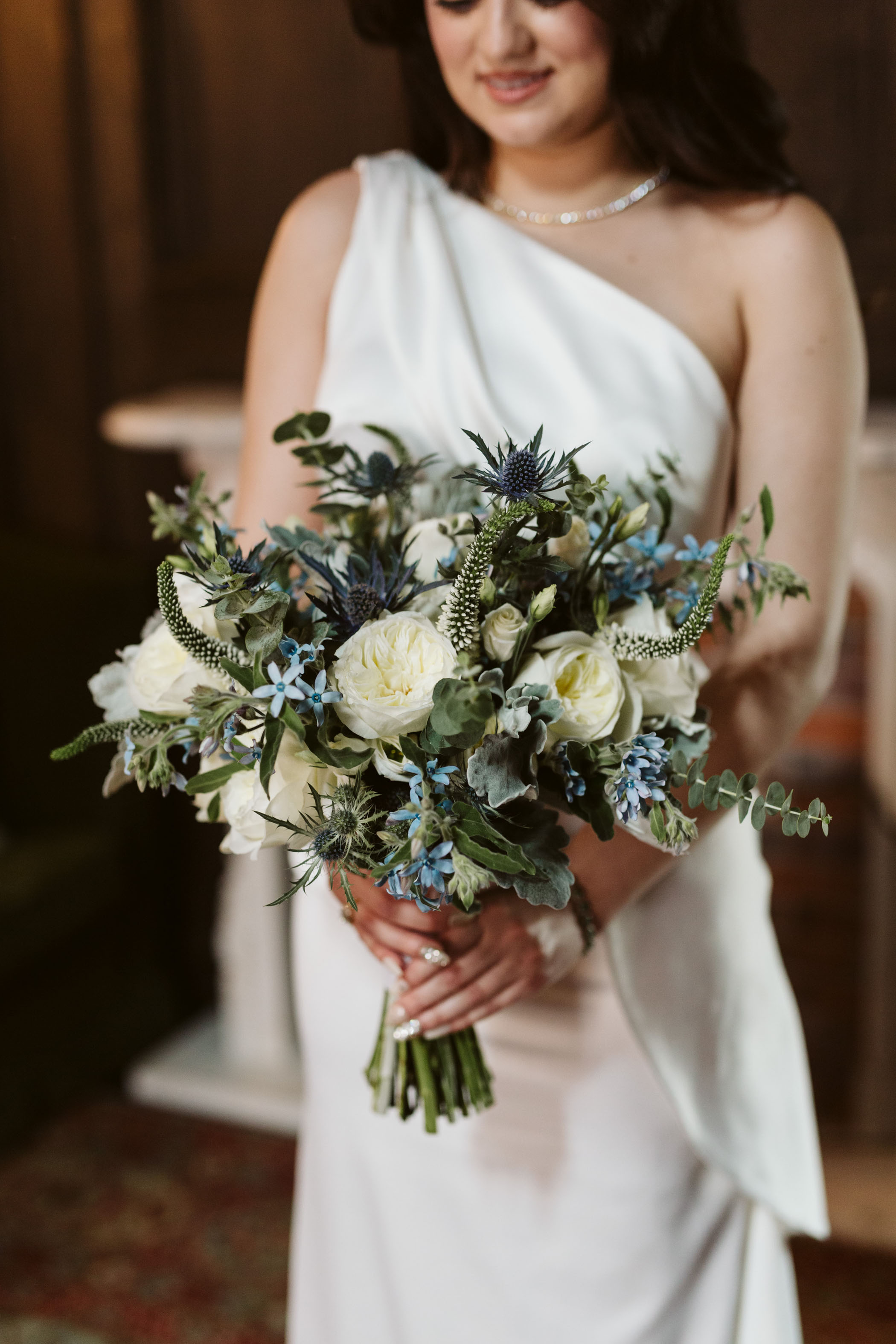 Green, white, and blue wedding bouquet