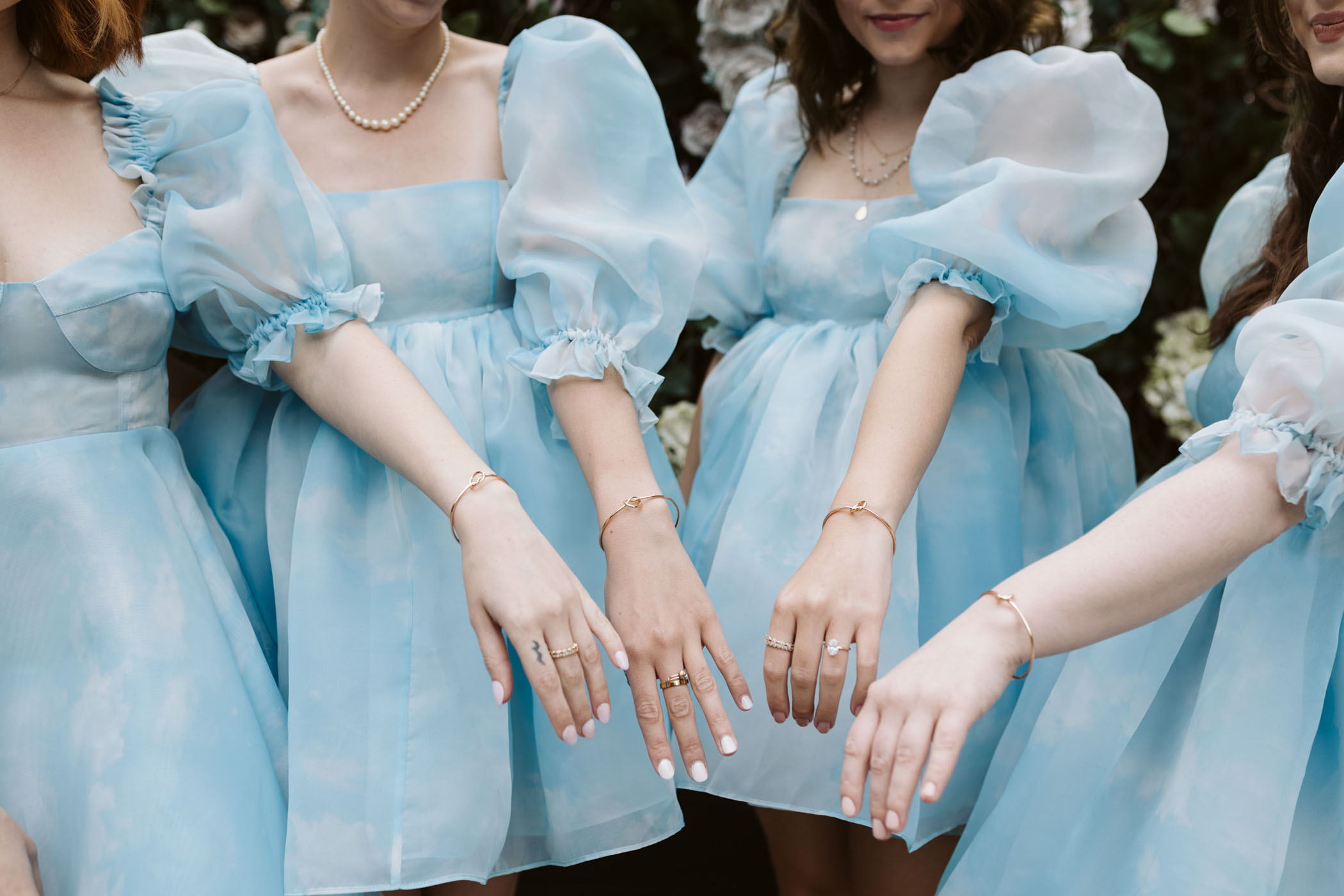 Selkie bridesmaids dresses with matching bracelets 