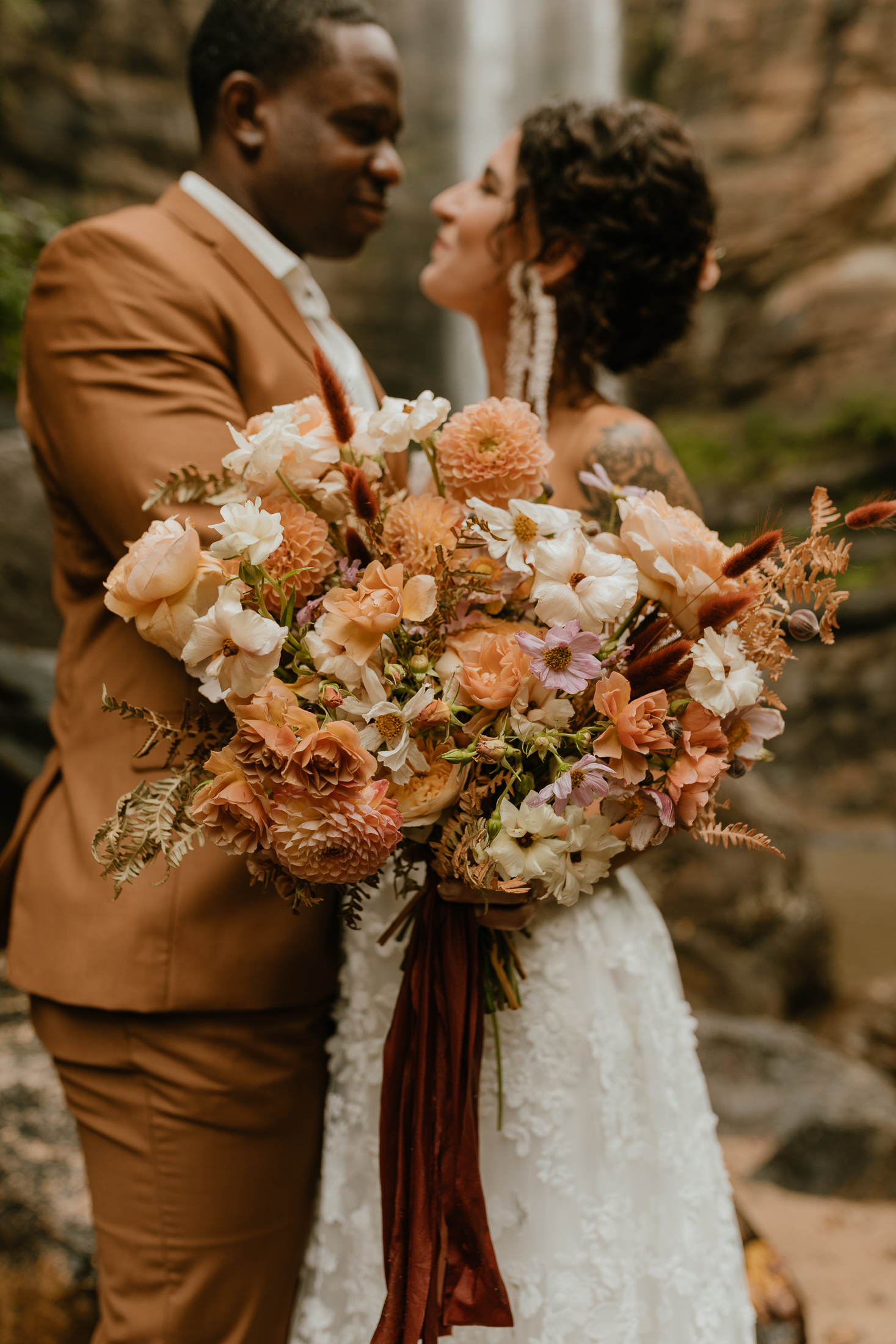 wildflower inspired orange wedding bouquet
