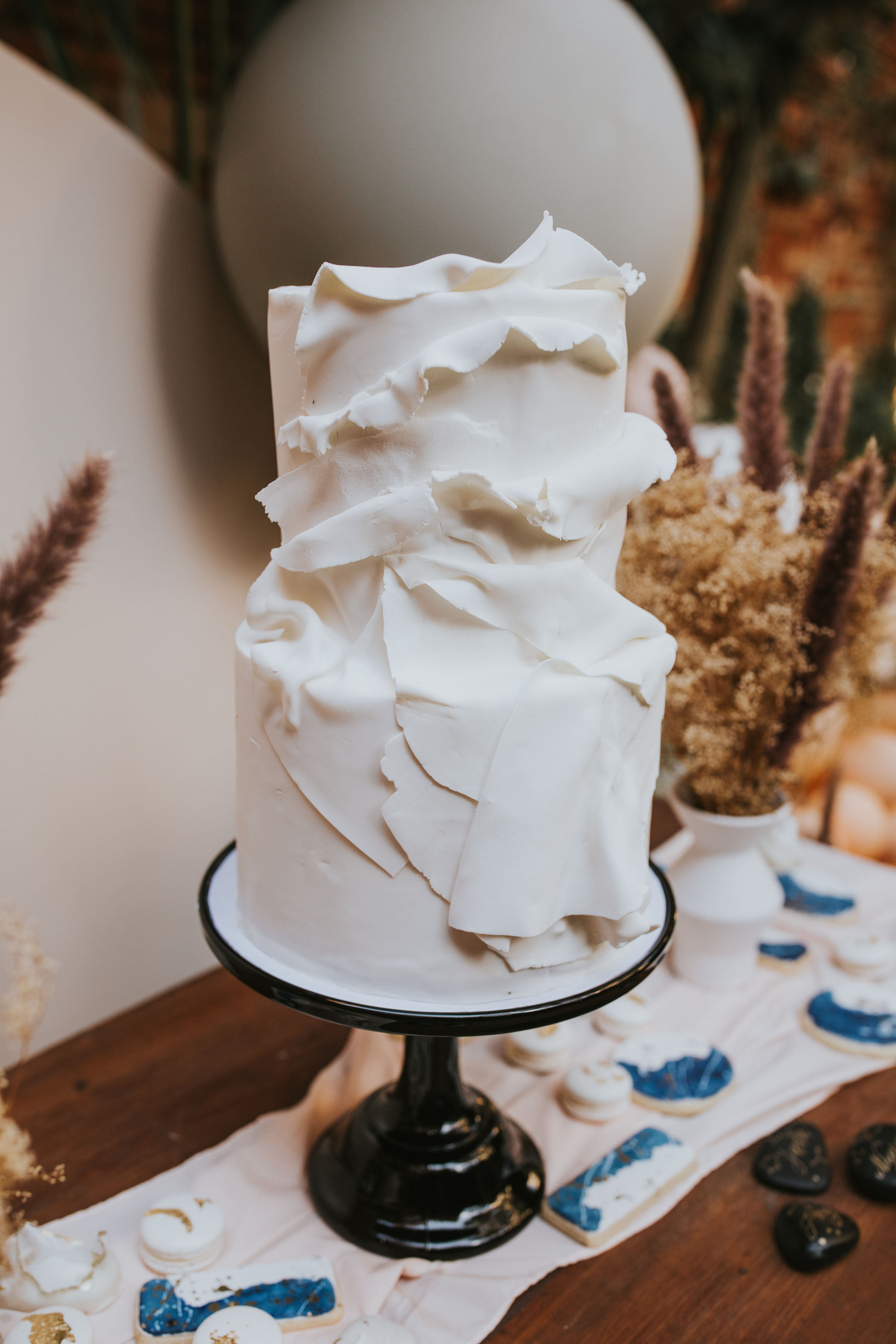 White Pleated Wedding Cake