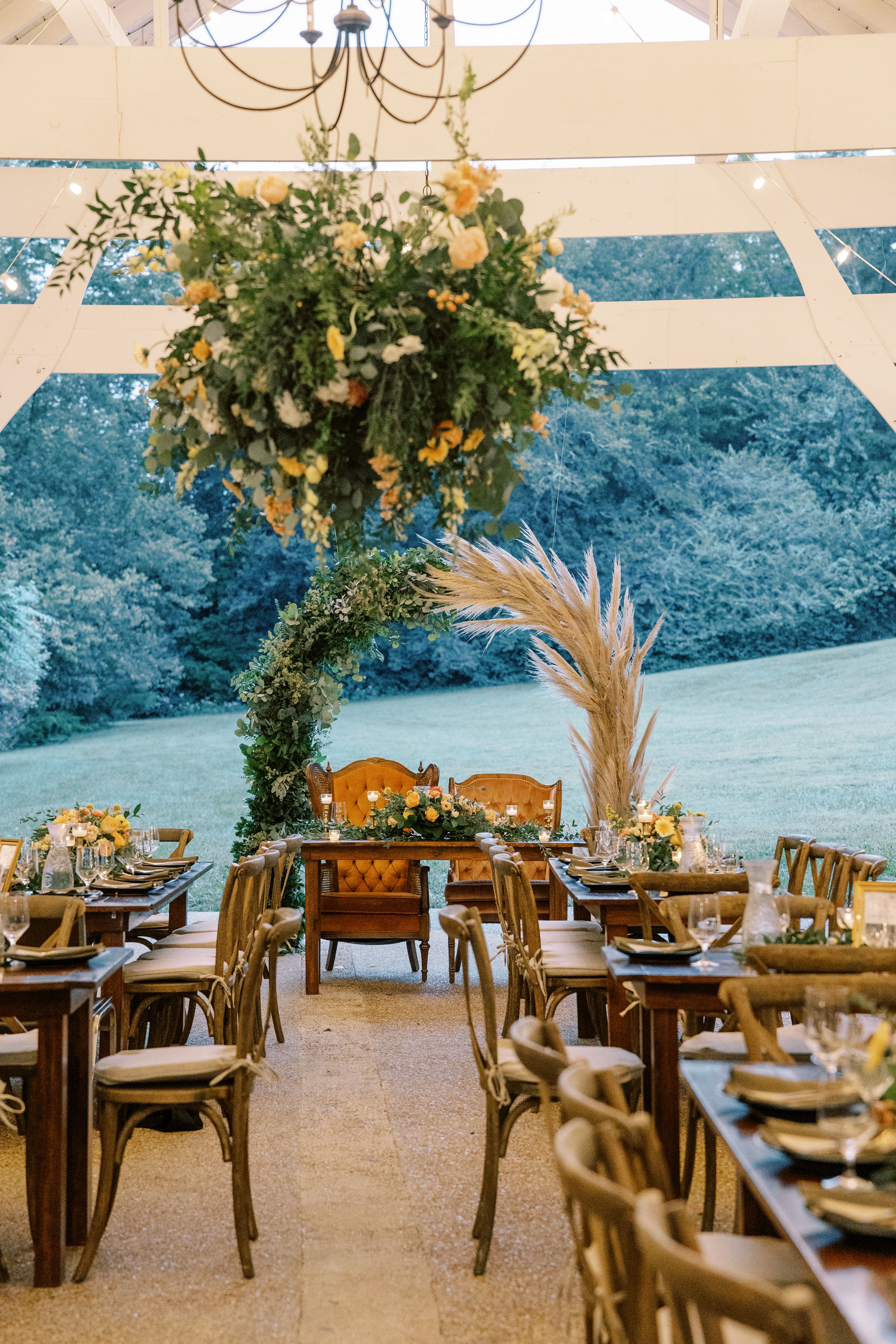 greenery and pampas grass ceremony arch
