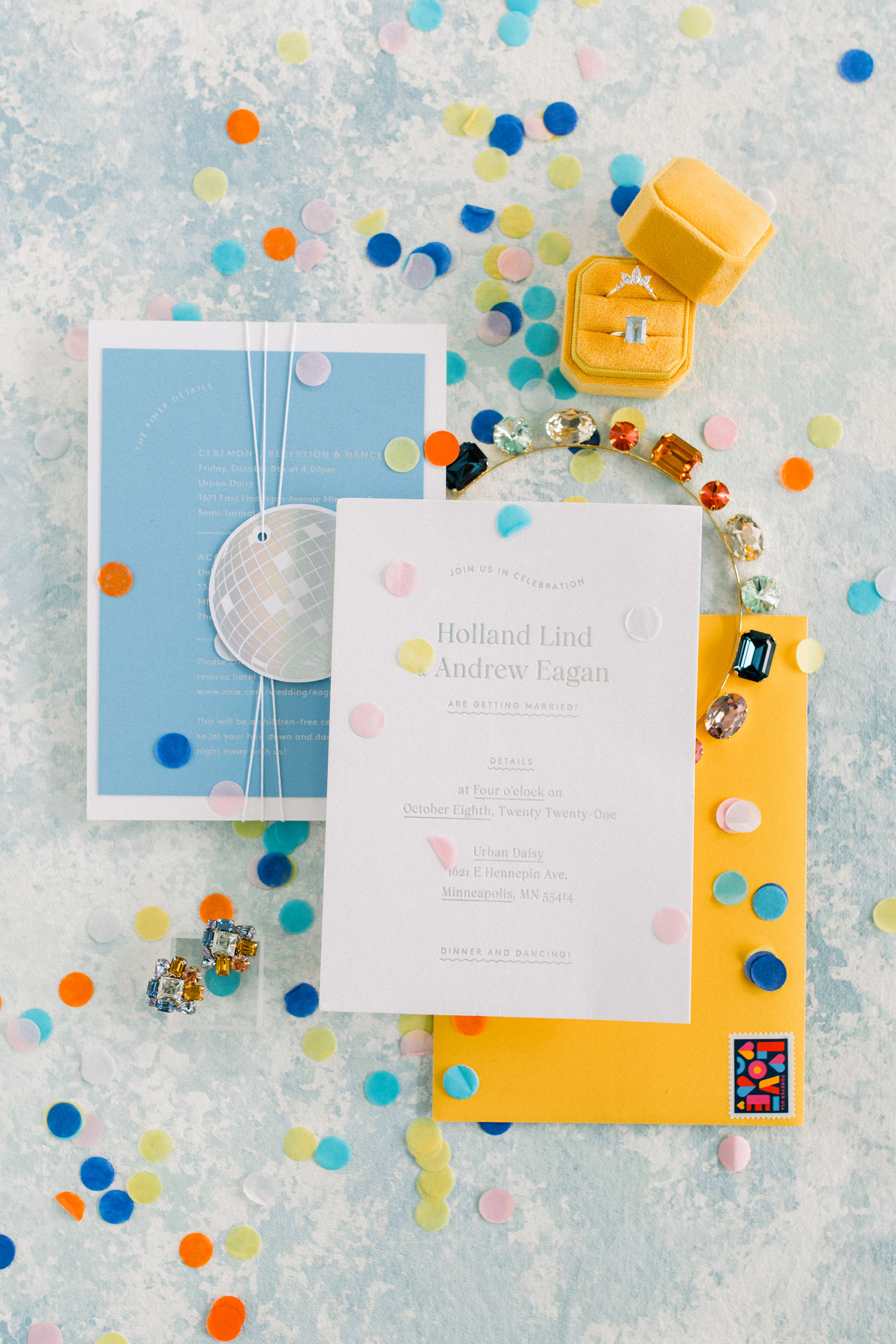 blue and yellow confetti wedding invitation