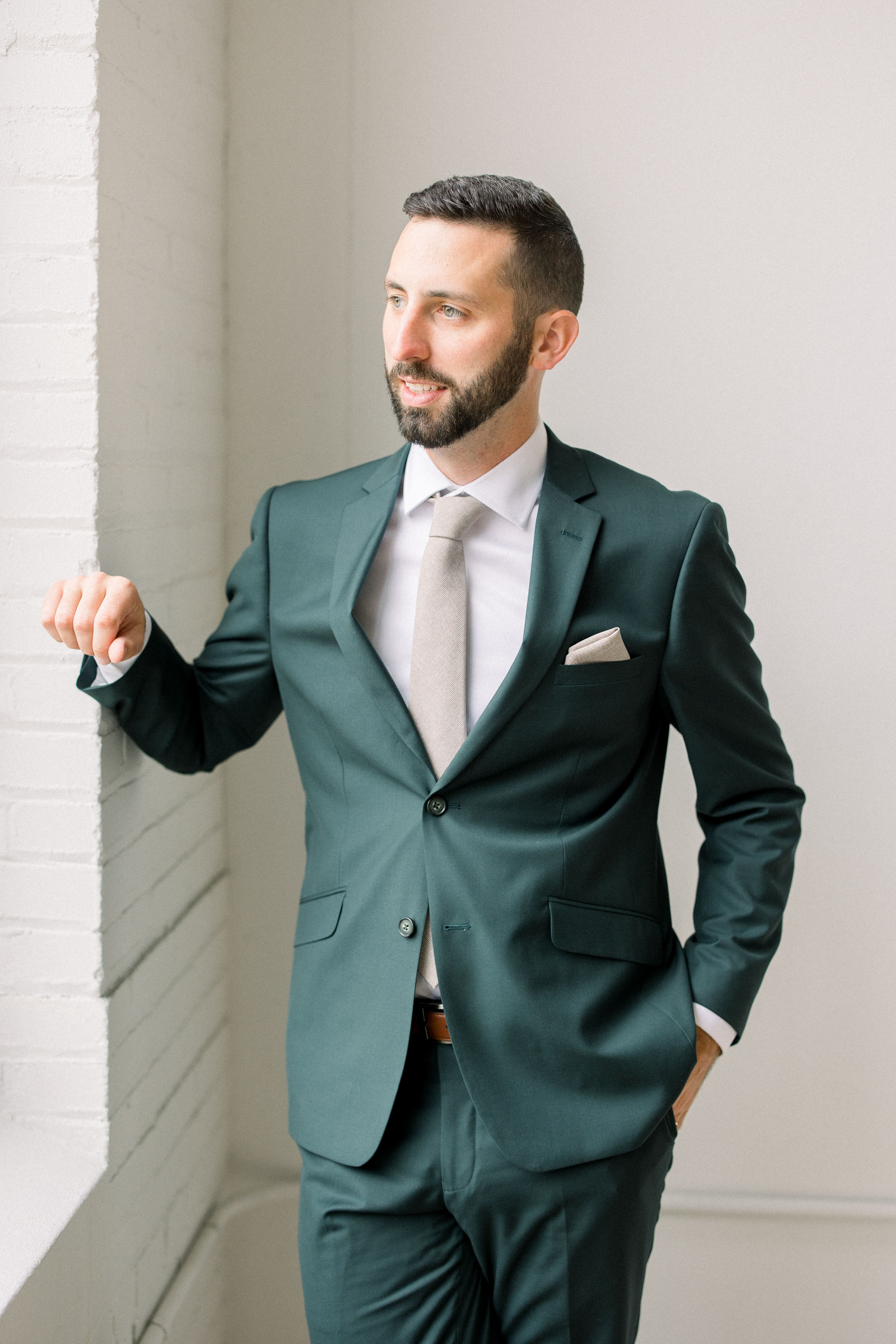 green groom suit