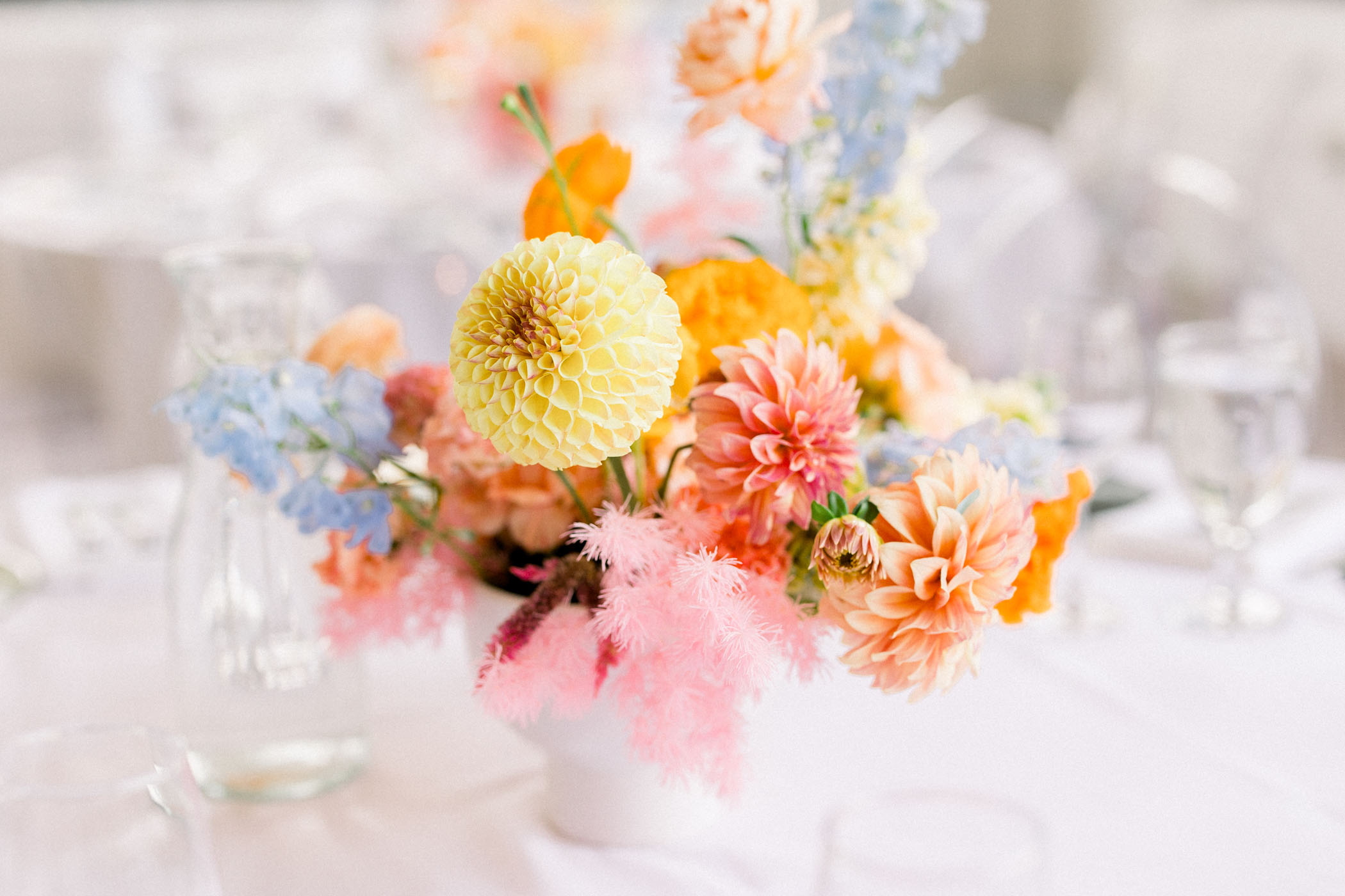 Colorful spring floral wedding centerpiece
