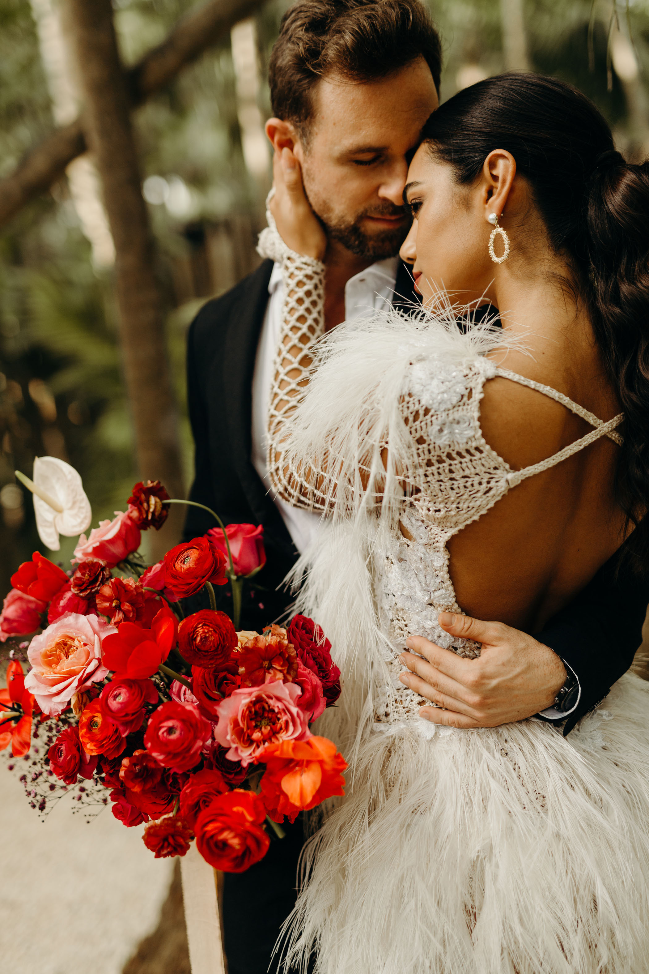 Mexico Beach Wedding with Red Flowers