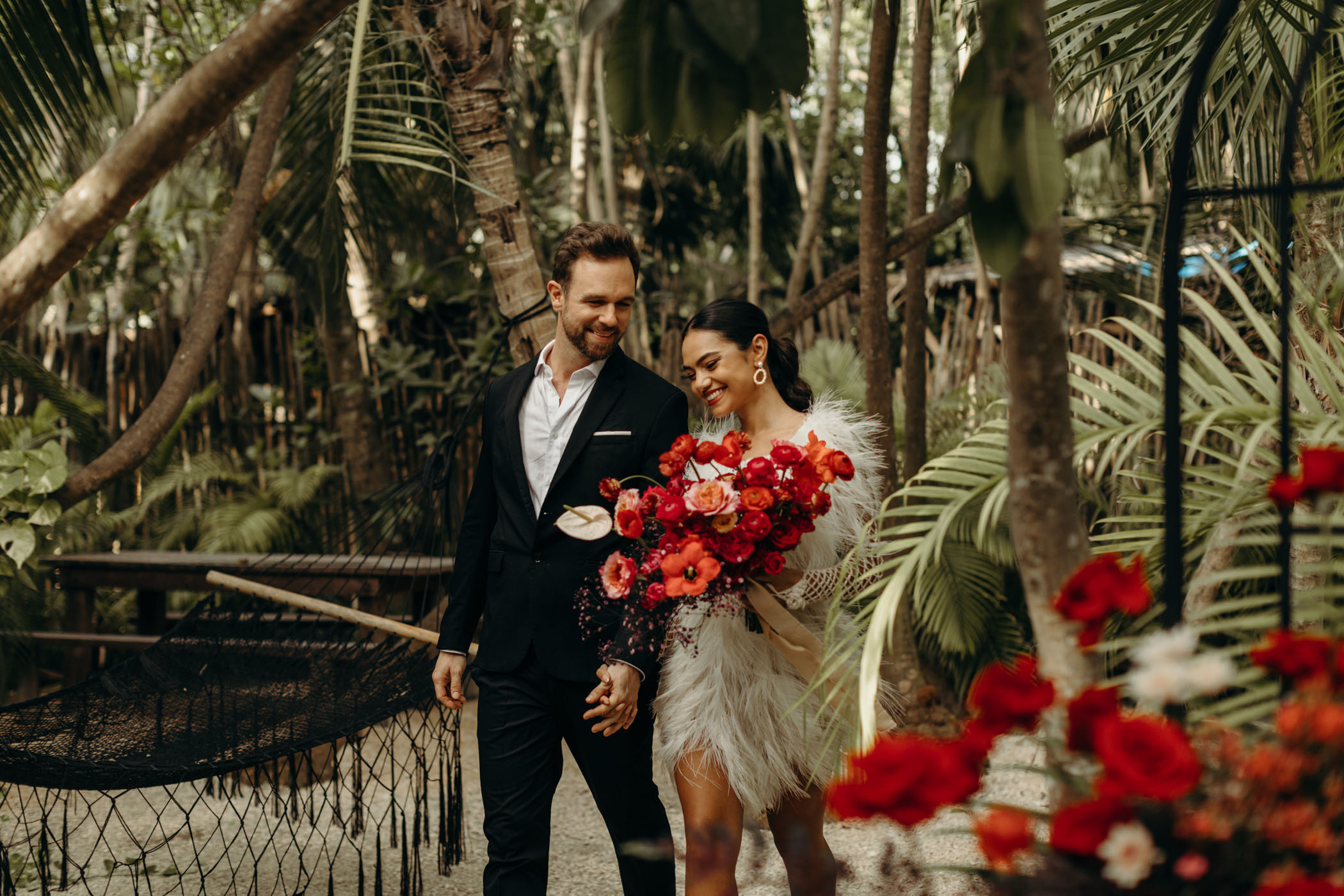 Mexico Beach Wedding with Red Flowers