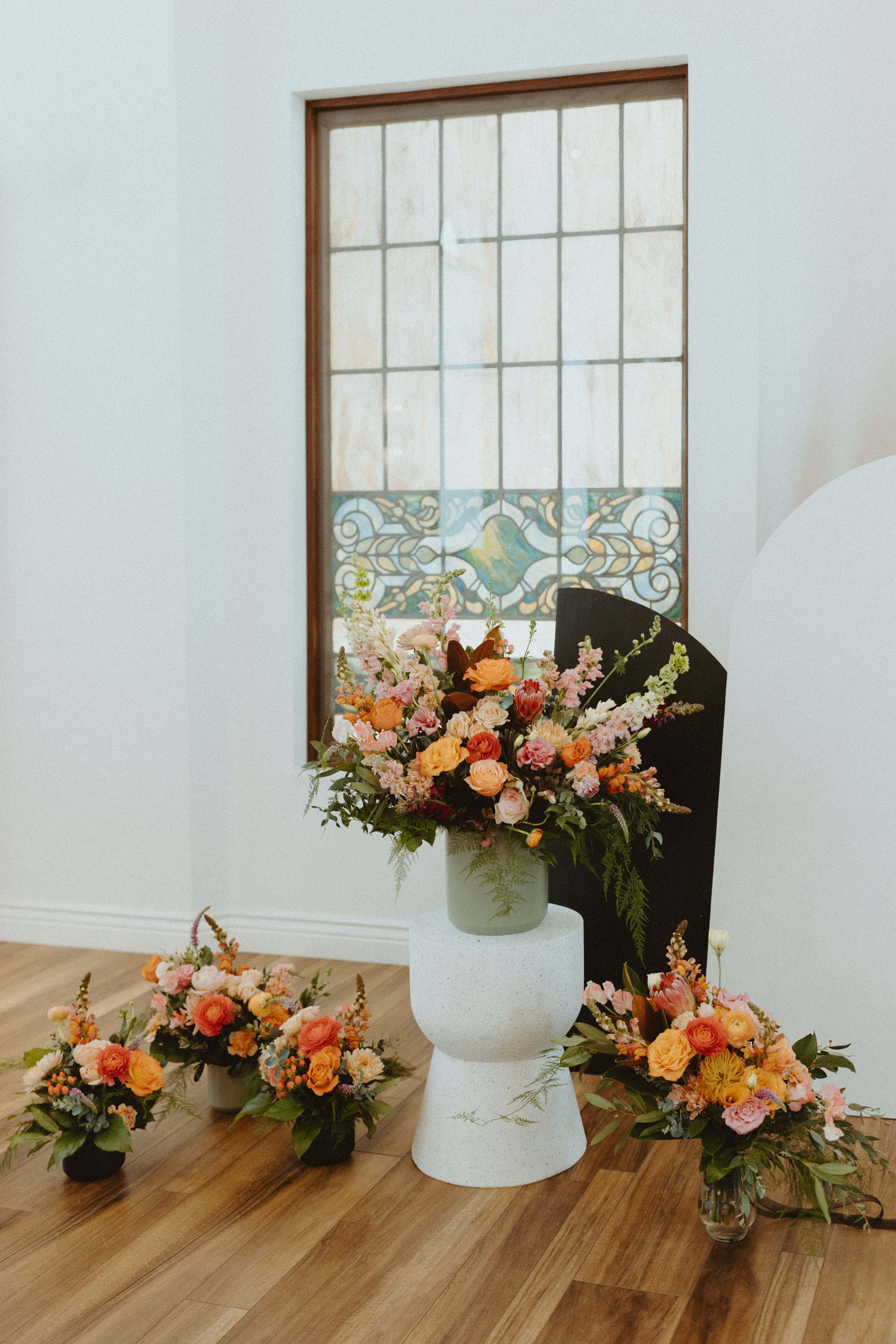 Modern pink and orange wedding florals