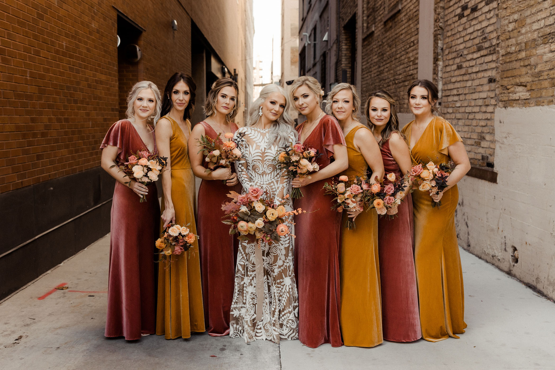 Bucks Fans Wedding in a Historical Music Milwaukee Hall Velvet Bridesmaids Dresses