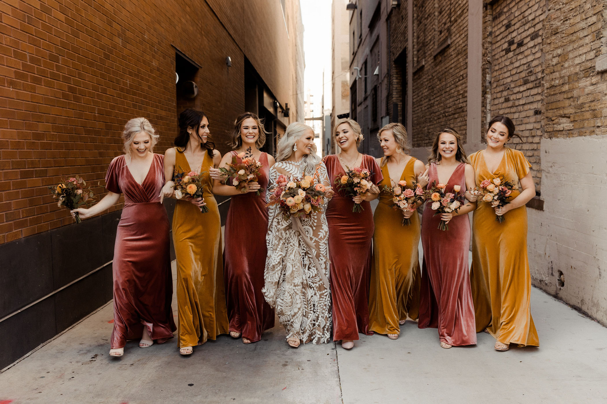 Bucks Fans Wedding in a Historical Music Milwaukee Hall Velvet Bridesmaids Dresses