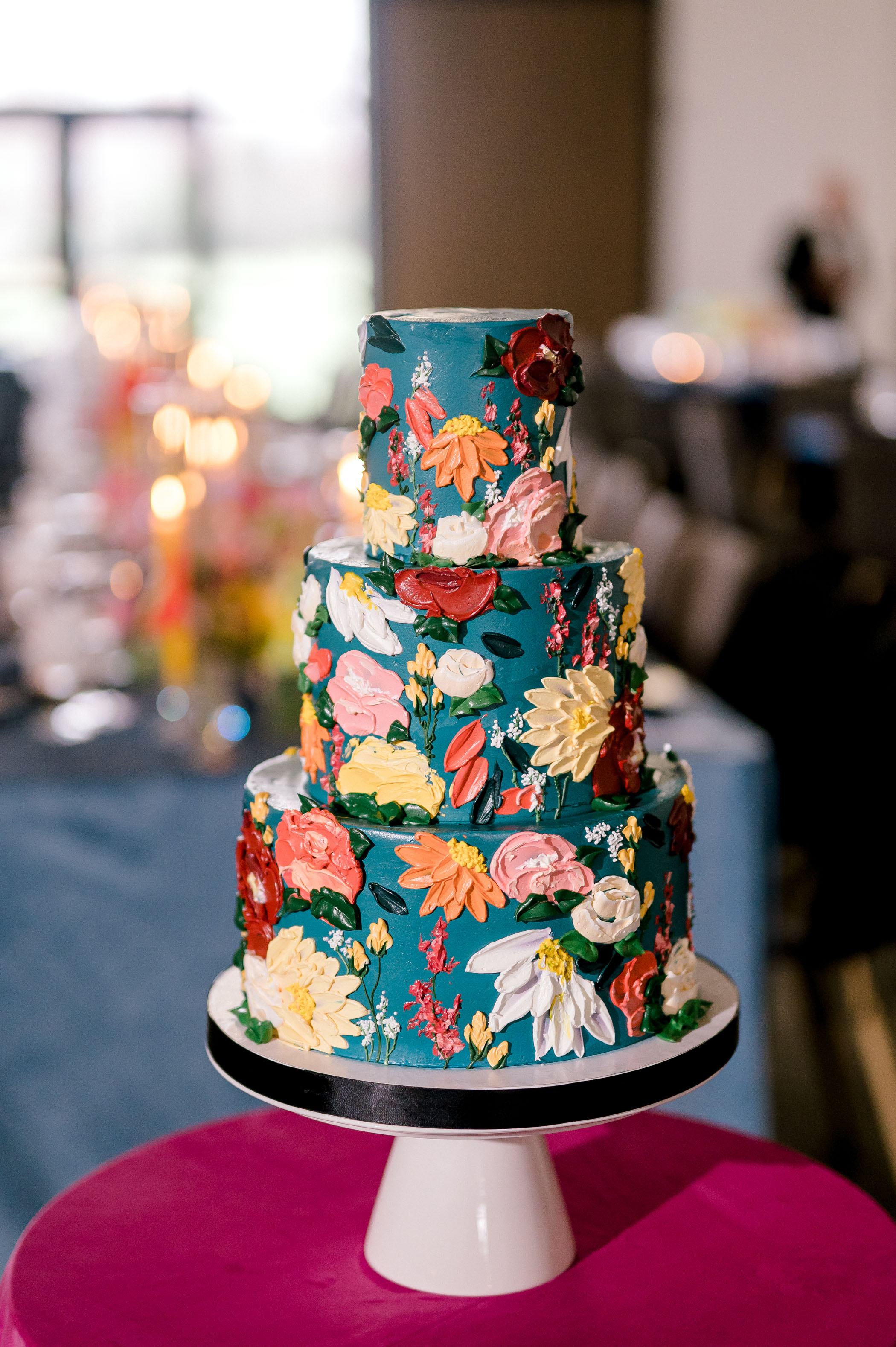 Blue floral painted wedding cake