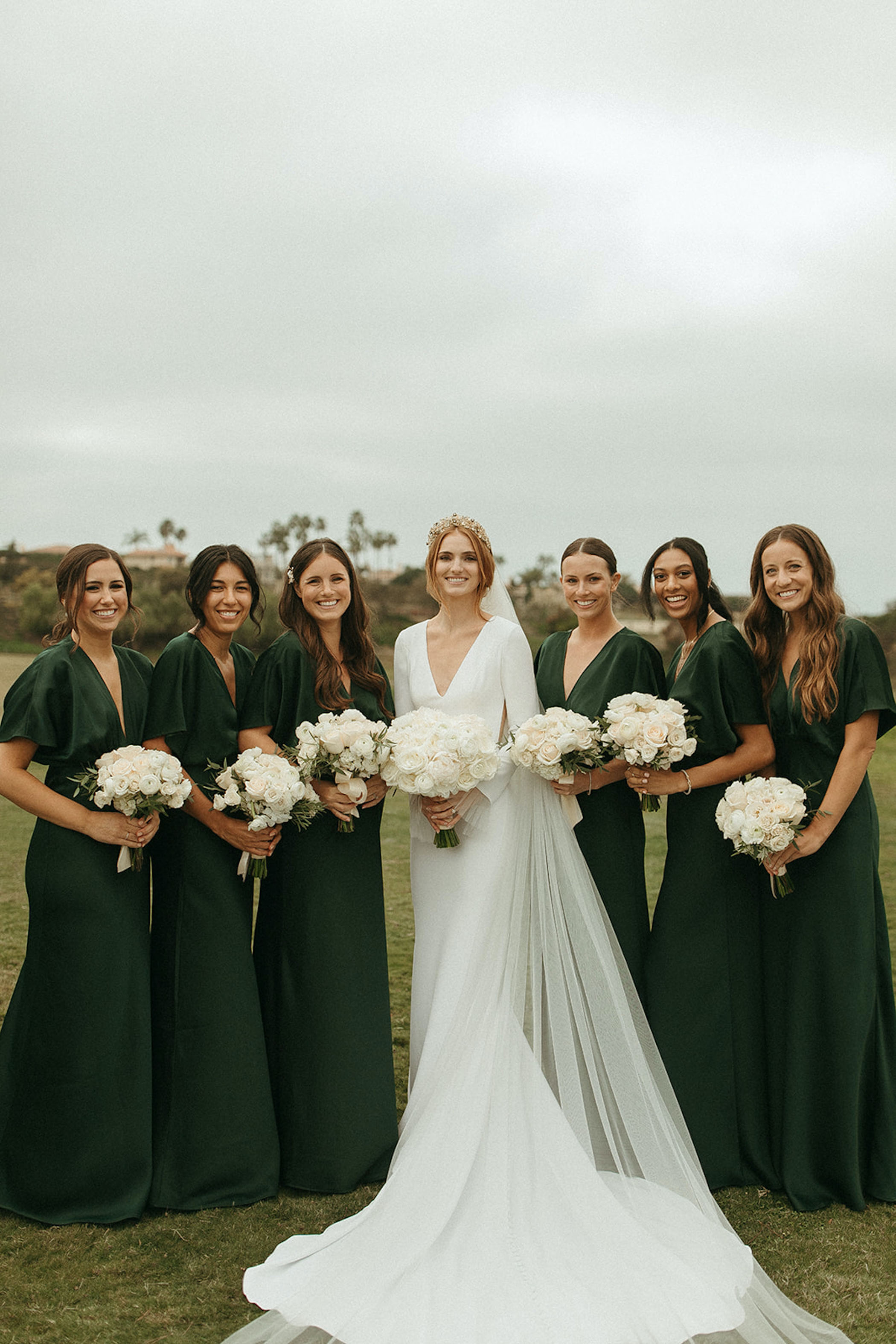 Modern Day Fairytale Wedding With Thousands of Sparkling Lights Green Bridesmaids Dresses