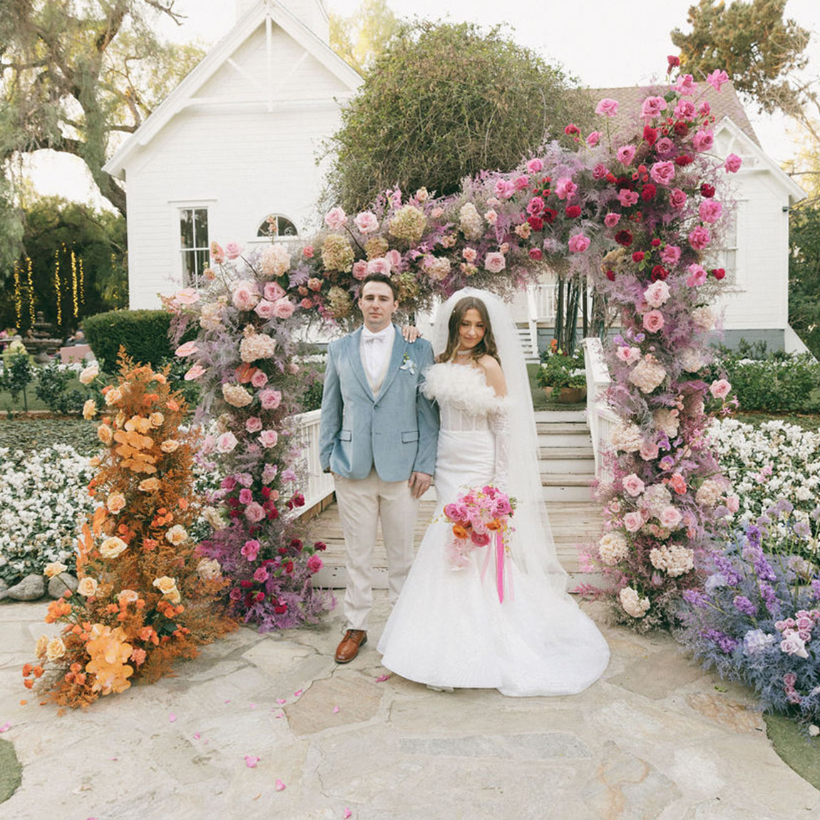 wedding ceremony rainbow pastel florals