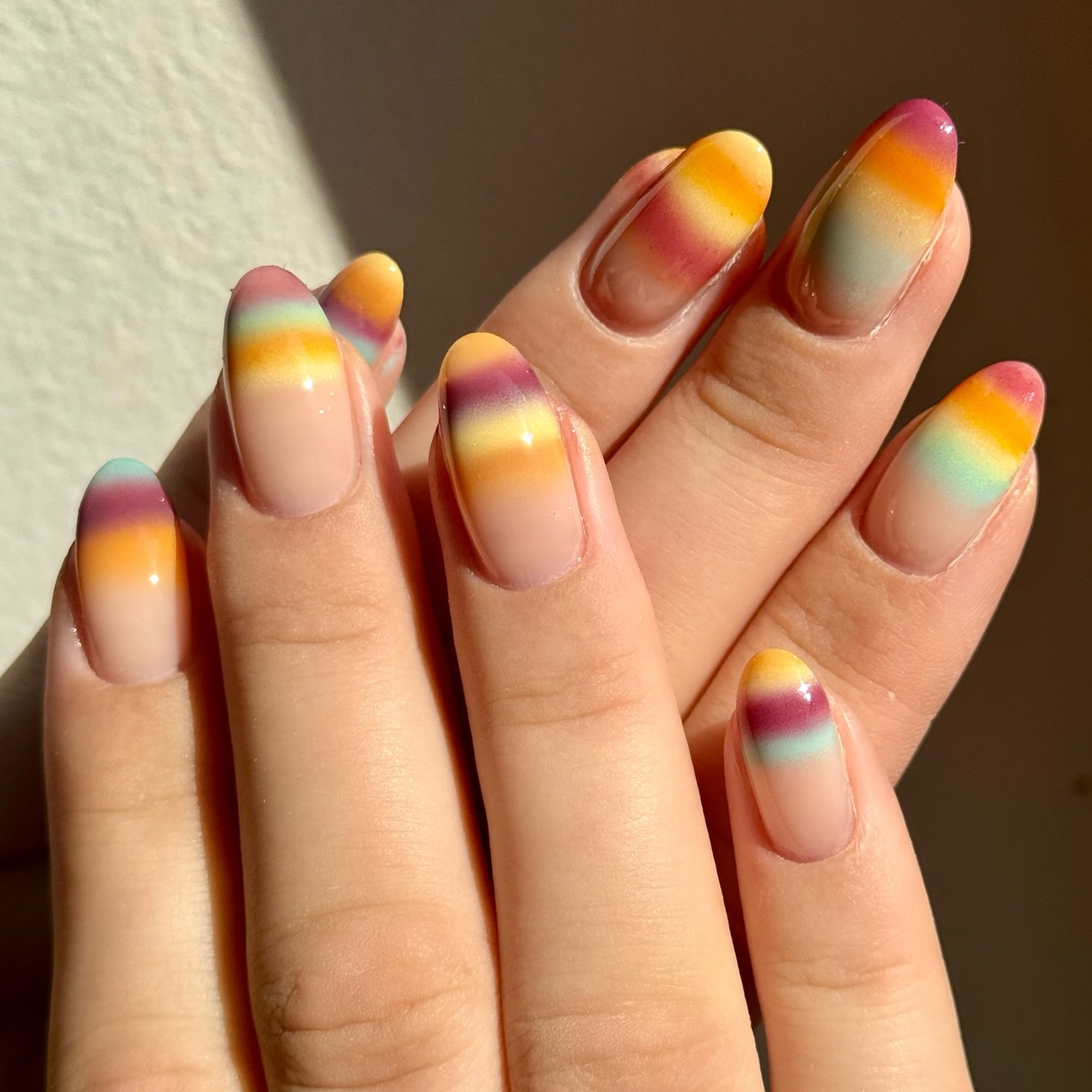 cute september nail ideas with striped sweater-inspired designs